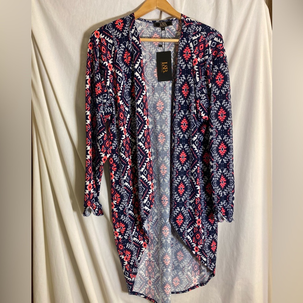 Womans open front top size S. NWT